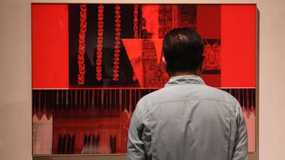 Sila at Maraya Art Centre brings historical examples of tatreez alongside its contemporary interpretations, such as Hazem Harb's Stitching Unity. Chris Whiteoak / The National