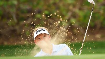 Soren Kjeldsen of Denmark plays his third shot on the first hole. Getty Images