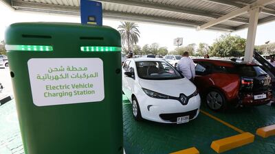 Electric cars on display during the launch of an electric car charging station at Dewa headquarters in Garhoud in Dubai. Pawan Singh / The National