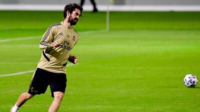 Real Madrid's Spanish midfielder Isco warms up. AFP