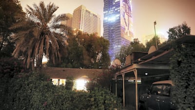 Desert Springs Village in Tecom is surrounded by tall buildings. Pawan Singh / The National