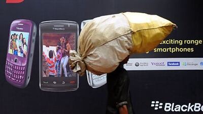 Research in Motion's lab in Egypt is supposed to provide training courses to increase the number of Arabic apps and expand local content for the BlackBerry 10 operating system Above, advertising for Blackberry handsets. Indranil Mukherjee / AFP