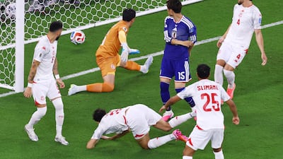 Japan's Daichi Kamada scores his country's first goal against Tunisia in Monterrey, Mexico. Reuters