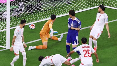 Japan's Daichi Kamada scores their first goal against Tunisia, in Monterrey. Reuters
