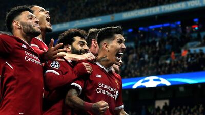 Roberto Firmino, right, has signed a new five-year contract with Liverpool. Nigel Roddis / EPA