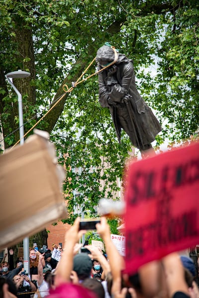 The statue of Edward Colston as protesters pull it down,in Bristol, Britain, June 7. Keir Gravil / Reuters