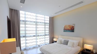 The bedroom area on the first floor in a five-bedroom Contemporary villa. Satish Kumar / The National