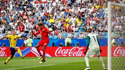 England's Dele Alli scores their second goal, making it 2-0. Felipe Trueba/EPA
