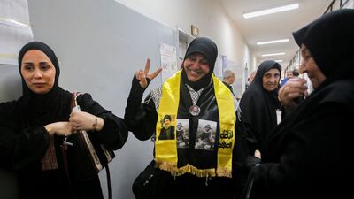 Hassan Nasrallah flashes the V for victory sign at a polling station in Nabatieh. AFP