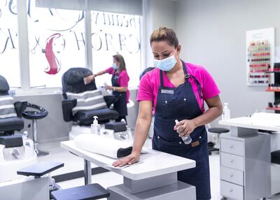 Some salons are also turning away unwell customers. Reem Mohammed / The National