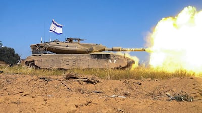 An Israeli tank opens fire in the Gaza Strip. Without an immediate halt to the war, Washington's carefully calibrated moves to reduce volatility in the region could come to naught. AFP