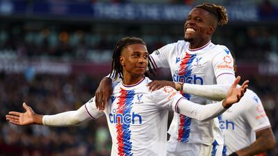 LONDON, ENGLAND - NOVEMBER 06: Michael Olise celebrates with Wilfried Zaha of Crystal Palace after scoring their team's second goal during the Premier League match between West Ham United and Crystal Palace at London Stadium on November 06, 2022 in London, England. (Photo by Bryn Lennon / Getty Images)