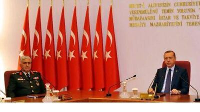 Turkey's prime minister, Tayyip Erdogan, was imperious at the annual meeting of the Supreme Military Council in Ankara yesterday. Adem Altan / AFP