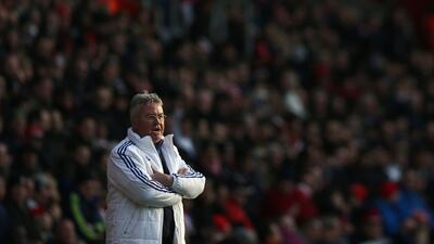 Chelsea's Dutch interim manager Guus Hiddink watches from the touchline during the English Premier League football match between Southampton and Chelsea at St Mary's Stadium in Southampton, southern England on February 27, 2016. Chelsea won the game 2-1. - RESTRICTED TO EDITORIAL USE. No use with unauthorized audio, video, data, fixture lists, club/league logos or 'live' services. Online in-match use limited to 75 images, no video emulation. No use in betting, games or single club/league/player publications. / AFP / JUSTIN TALLIS / RESTRICTED TO EDITORIAL USE. No use with unauthorized audio, video, data, fixture lists, club/league logos or 'live' services. Online in-match use limited to 75 images, no video emulation. No use in betting, games or single club/league/player publications.