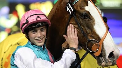Rider James Doyle with Cityscape after winning the 2012 Dubai Duty Free at Meydan racecourse