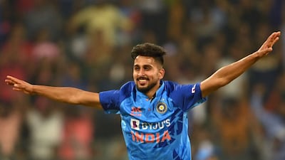 India's Umran Malik celebrates after taking the wicket of Sri Lanka's captain Dasun Shanaka (not pictured) during the first Twenty20 international cricket match between India and Sri Lanka at the Wankhede Stadium in Mumbai on January 3, 2023. (Photo by Punit PARANJPE / AFP) / ----IMAGE RESTRICTED TO EDITORIAL USE - STRICTLY NO COMMERCIAL USE-----