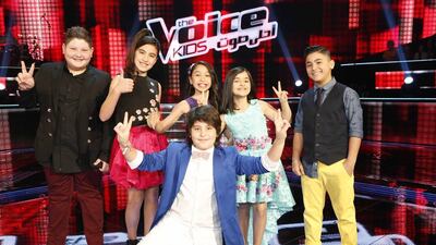 A handout photo of finalists The Voice Kids Ahla Sawt (Courtesy: MBC)l-r: Zain Obeid, Leen Al Hayek, Juwayriyah Hamdi, Mirna Hanna, Amir Amourifront: Ghady Bechara