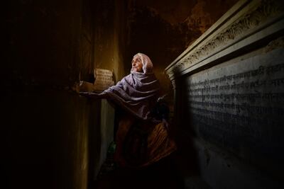 Mehr-dun-Nisa, a grave keeper, at the Mewa Shah graveyard in Karachi. Though not Jewish, she and her family have been grave keepers of this Jewish cemetery for generations. Mobeen Ansari