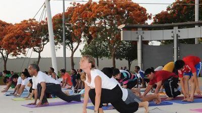 Yogathon participants will learn 12 sequential postures that are meant to relax the body and mind. Courtesy Yogathon 2013
