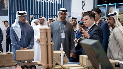 Sheikh Mohamed and Sheikh Mansour tour the event