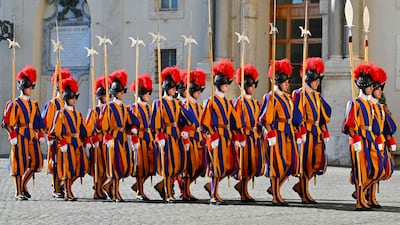 Swiss Guards taking position before Mr Abbas's arrival in San Damaso courtyard in the Vatican. AFP