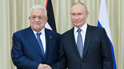 Russian President Vladimir Putin, right, with Palestinian President Mahmoud Abbas. Reuters