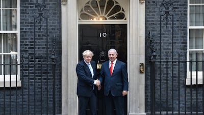 Boris Johnson greets Israel's Prime Minister Benjamin Netanyahu at 10 Downing Street in 2019. Getty Images