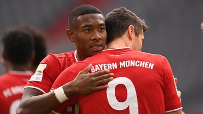 David Alaba (L) and Bayern's Robert Lewandowski celebrate. Getty