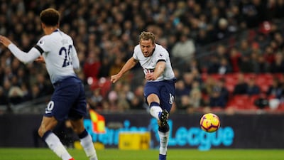 Harry Kane shoots to score Tottenham;s second goal against Chelsea. Reuters