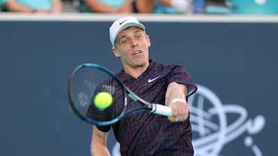 Denis Shapovalov hits a backhand to Taylor Fritz. Reuters