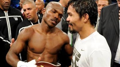 Timothy Bradley and Manny Pacquiao talk after their WBO welterweight title fight.