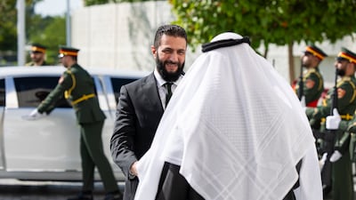 Sheikh Mohamed receives Mr Al Shara before a meeting at Al Shati Palace. Ryan Carter / UAE Presidential Court