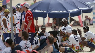 Athletes relax in the shade during the 2015 World Championships of Beach Ultimate (WCBU) at the JBR beach in Dubai. Satish Kumar / The National