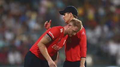 England captain Eoin Morgan, right, consoles Ben Stokes during the final over against West Indies at Kolkata on Sunday night. Ryan Pierse / Getty Images
