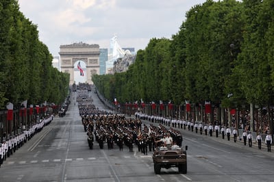 Troops parade during the annual Bastille Day military ceremony on the Champs-Elysees avenue in Paris, France. Reuters