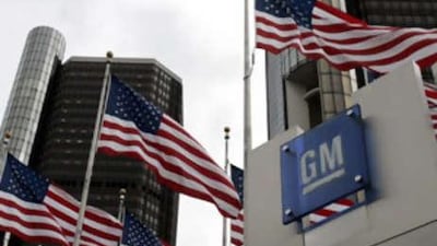 United States flags flutter in the wind in front of the GM headquarters in downtown Detroit, Michigan. The world's largest toy maker Mattel has surpassed a the struggling company in market value.