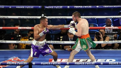 Gabriel Flores Jr (left) and Matt Conway in the light weight bout at the MGM Grand, Las Vegas. PA Wire.