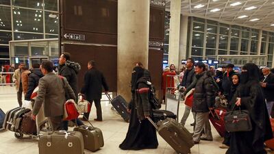 Yemeni children and their guardians arrive at Queen Alia International Airport, south of the Jordanian capital Amman, following a second United Nations medical evacuation from Sanaa. AFP