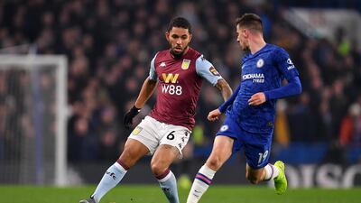 Aston Villa's Douglas Luiz takes on Mason Mount. Getty Images