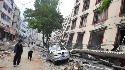 Estimates put the direct damage of the May 12, 2008, Sichuan earthquake in China at $29 billion. Above, survivors walk through the rubble at Yingxiu town in Wenchuan. Teh Eng Koon / AFP