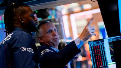 Traders on the floor of the New York Stock Exchange. Fund managers increased their average cash balances to 6.1 per cent in September, the highest level in more than two decades. AP