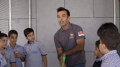 UAE captain Mohammed Tauqir shown leading a cricket workshop in Sharjah last month. Clint McLean for The National / January 12, 2015