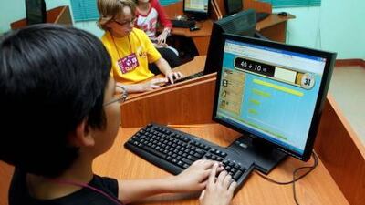 Sharjah, 1st March 2011. Caleb Lee (11 years old and in Grade 6) shows his speed in solving simple mathematical problems, during the World Math Day, held at Australian International School. (Jeffrey E Biteng / The National)