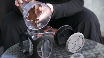 Step 2: Pour freshly ground beans into a French press. Silvia Razgova / The National