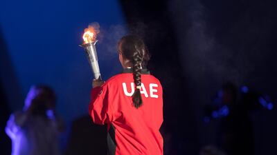 UAE athlete Mariam Al Zaabi, carries the Flame of Hope during the opening ceremony of the Special Olympics IX MENA Games Abu Dhabi 2018. Ryan Carter for the Crown Prince Court