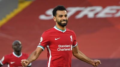 Mohamed Salah celebrates scoring Liverpool's fourth goal to complete his hat-trick against Leeds on September 12, 2020. Reuters