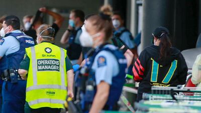 New Zealand authorities say they shot and killed a violent extremist after he entered a supermarket and stabbed and injured six shoppers. New Zealand Herald via AP