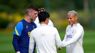 Tottenham Hotspur's Richarlison, Son Heung-min and goalkeeper Fraser Forster during a training session at Hotspur Training Ground. PA