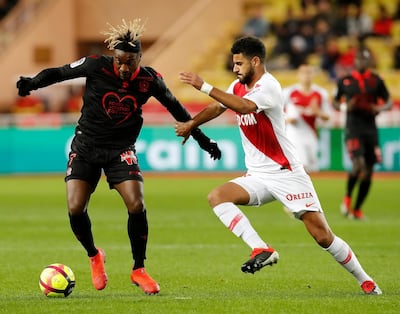 Youssef Ait-Bennasser, right, of Monaco and Allan Saint Maximin of OGC Nice in action during their French Ligue 1 match at Stade Louis II. Sebastien Nogier / EPA