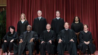 The nine US Supreme Court justices have adopted a formal ethics code. AP